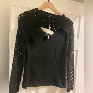 Aqua cut out crew neck top with long sleeves .